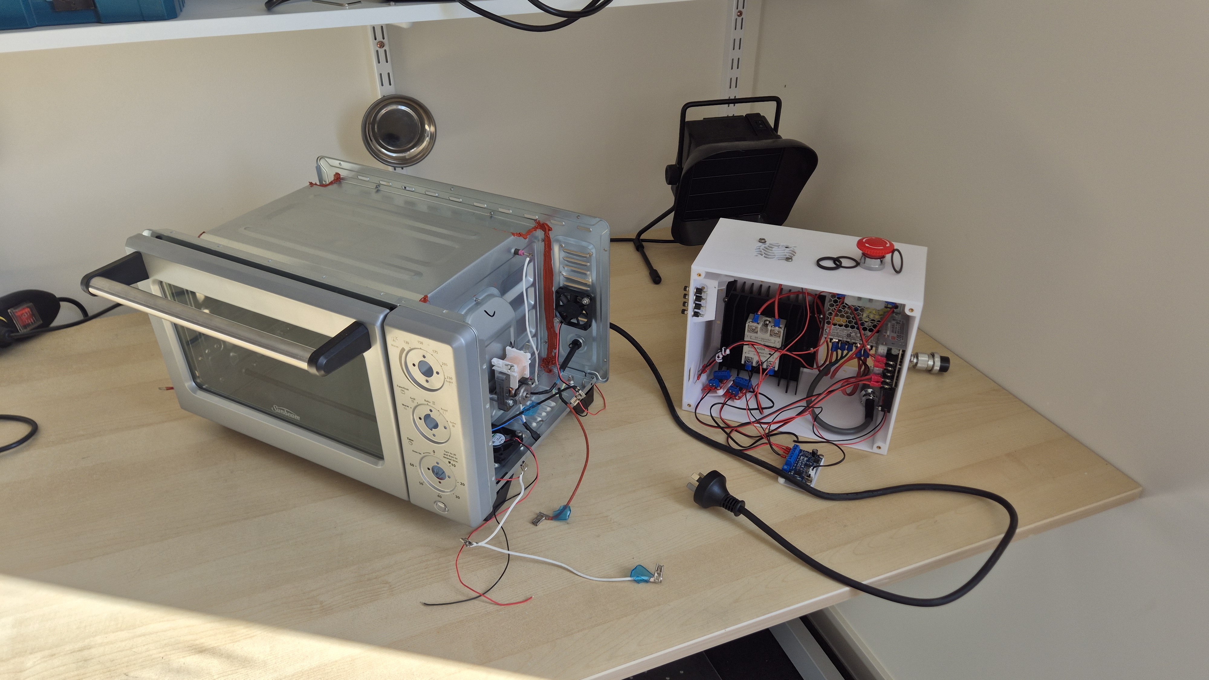 Reflow oven in build Reflow oven on bench with electronics apart