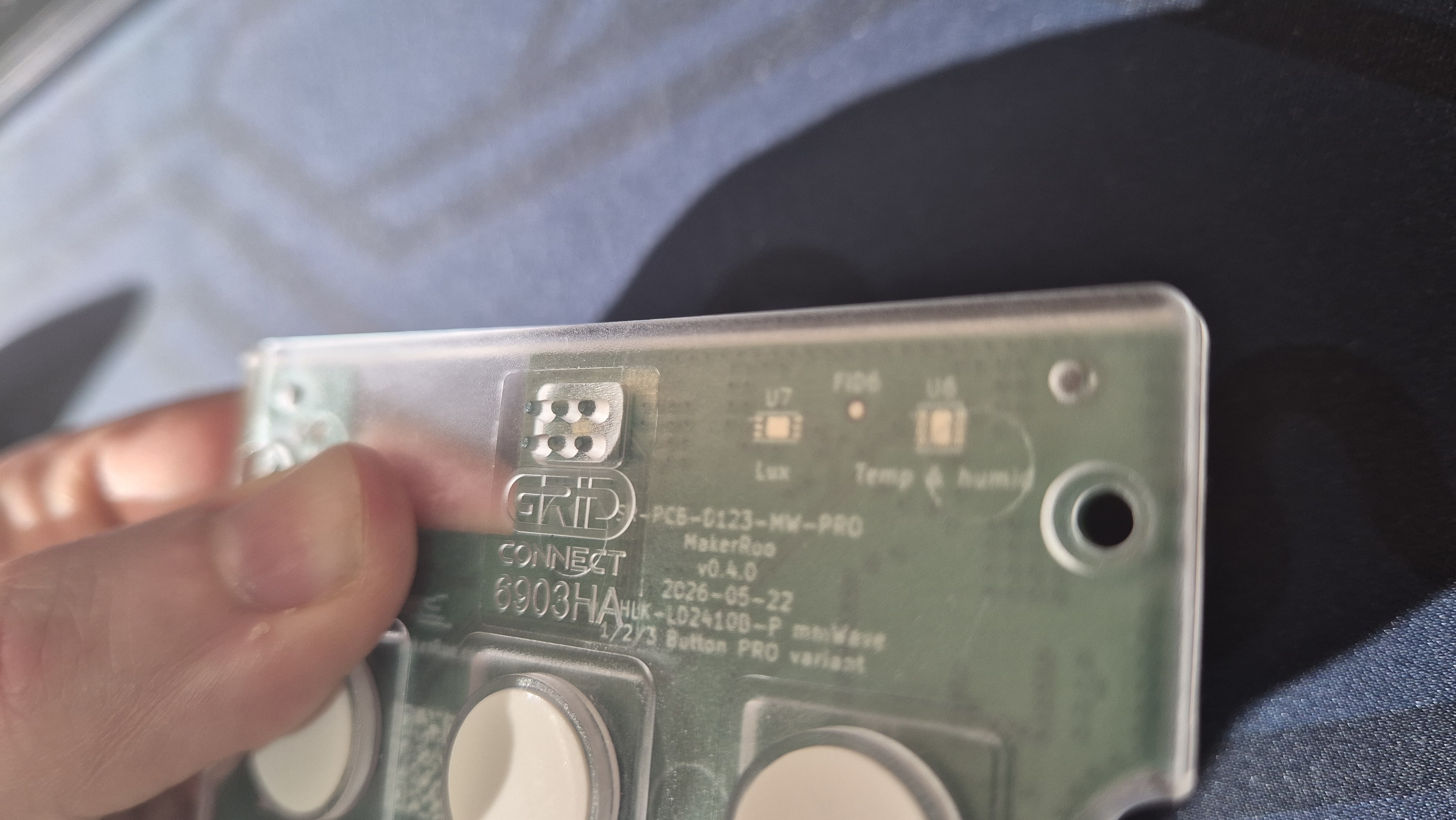 Deta button plate over the board, showing actual clearance